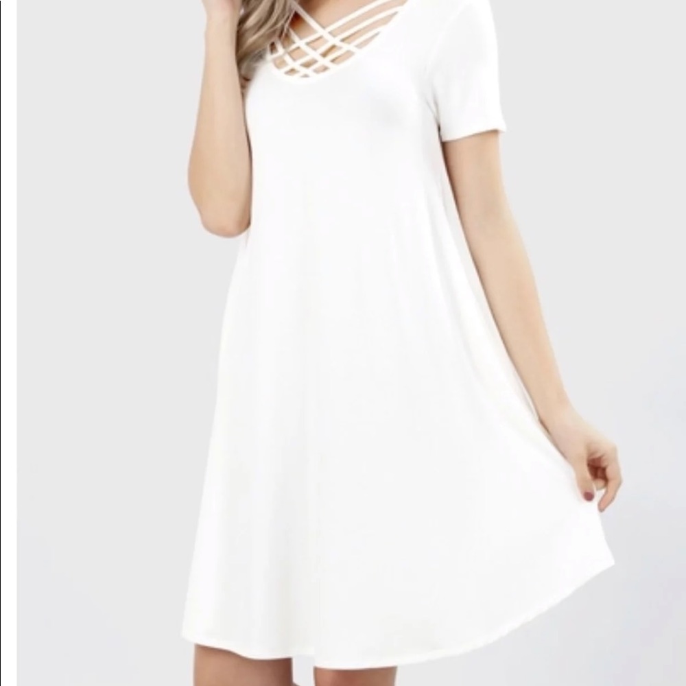 Ivory criss cross boutique dress